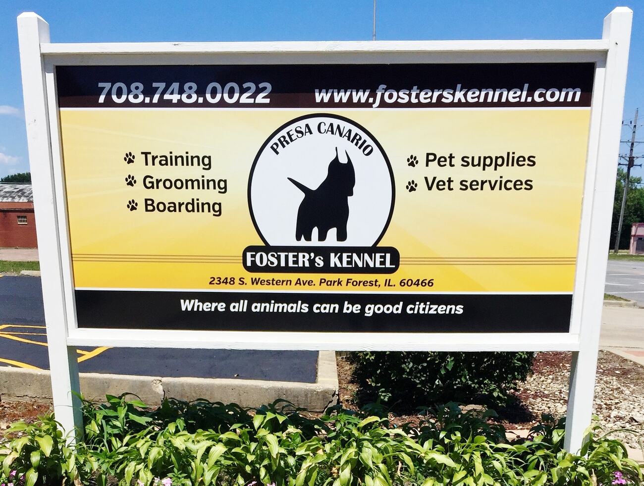 Foster's Kennel gold sign